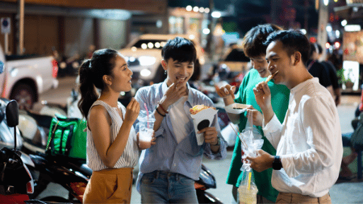 Thai consumers eating street food